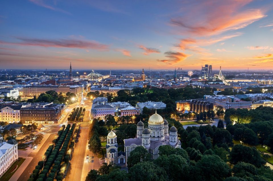 a skyline view of riga city in the golden hour